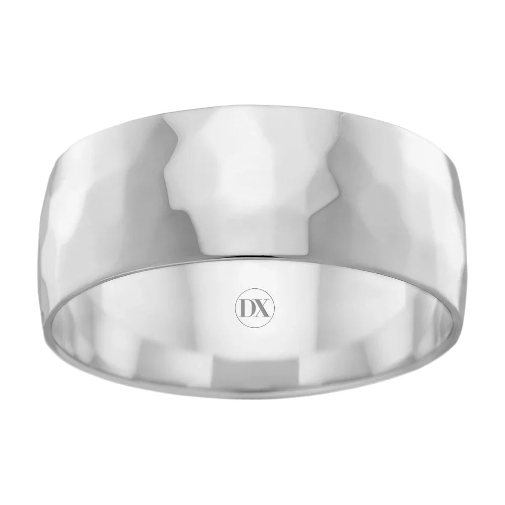 Wide silver ring with a hammered texture and DX engraved inside the band, shown on a white background.