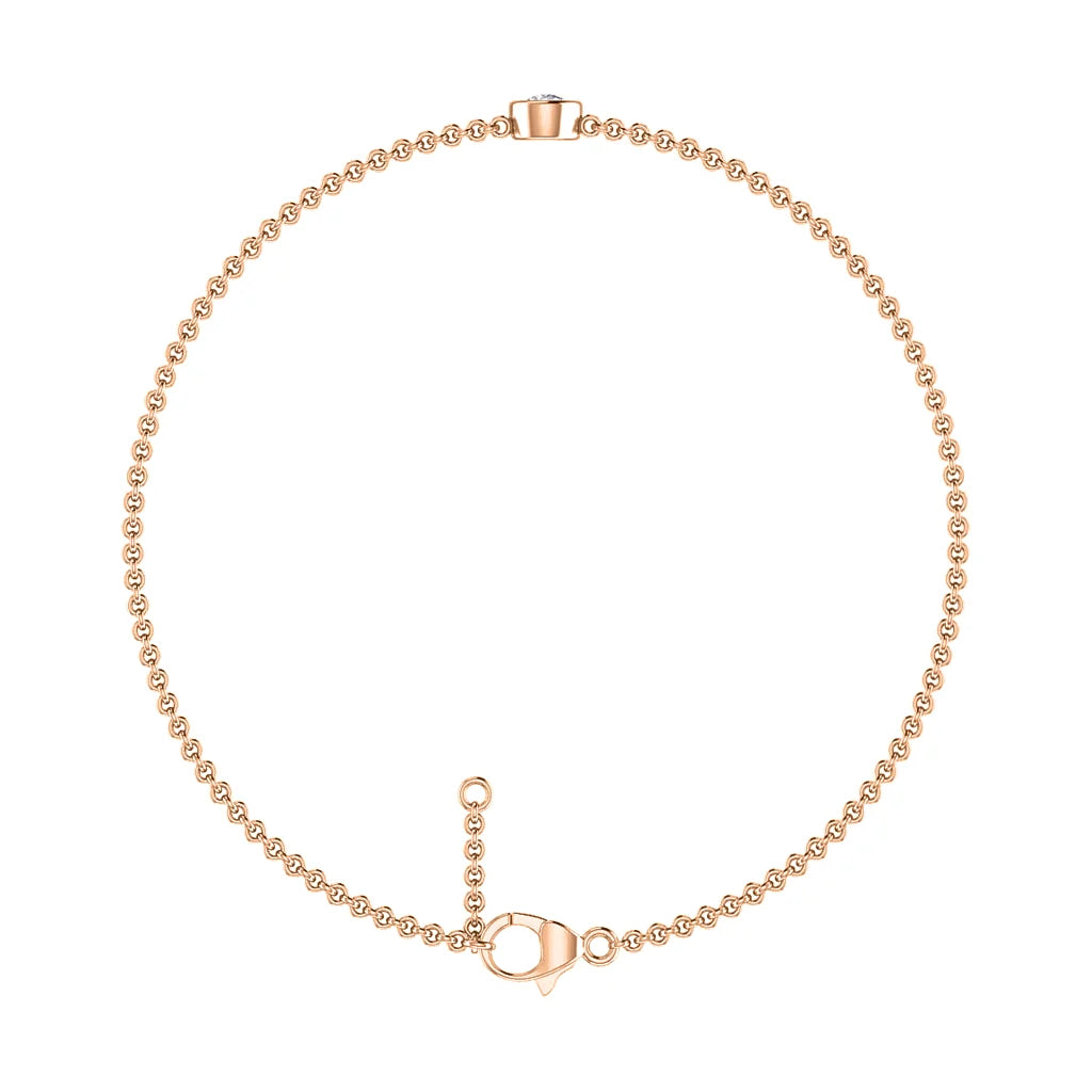 Delicate gold bead chain bracelet with a lobster clasp and adjustable extender, displayed on a white background.