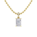 Gold chain necklace with an emerald-cut diamond pendant and small diamonds on the bail, shown on a white background.