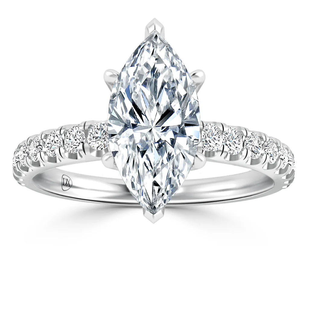 Marquise-cut diamond ring with diamond-accented band in white metal, shown against a white background.