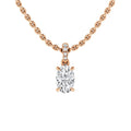 A rose gold chain necklace with an oval diamond pendant and three small round diamonds above the center stone.