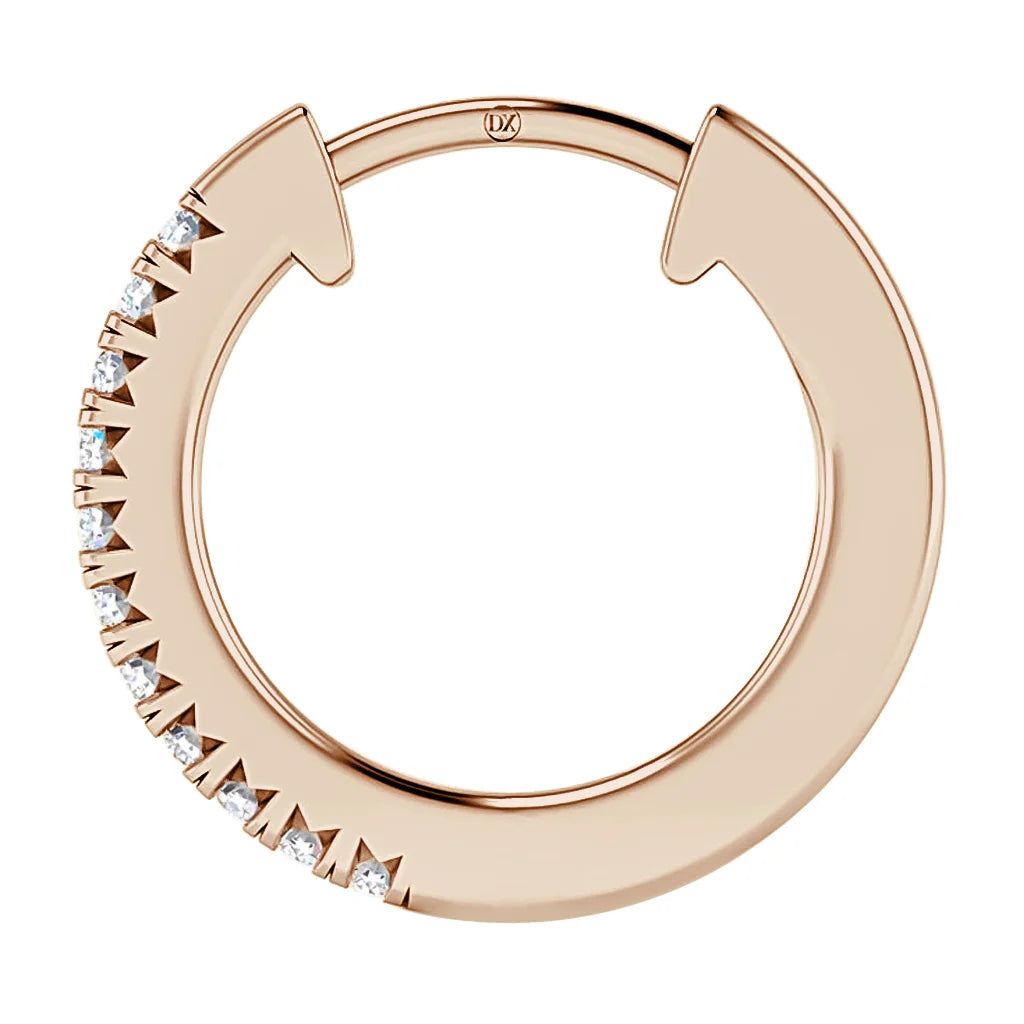 Rose gold hoop earring with one side adorned by small, evenly spaced white gemstones in a prong setting.