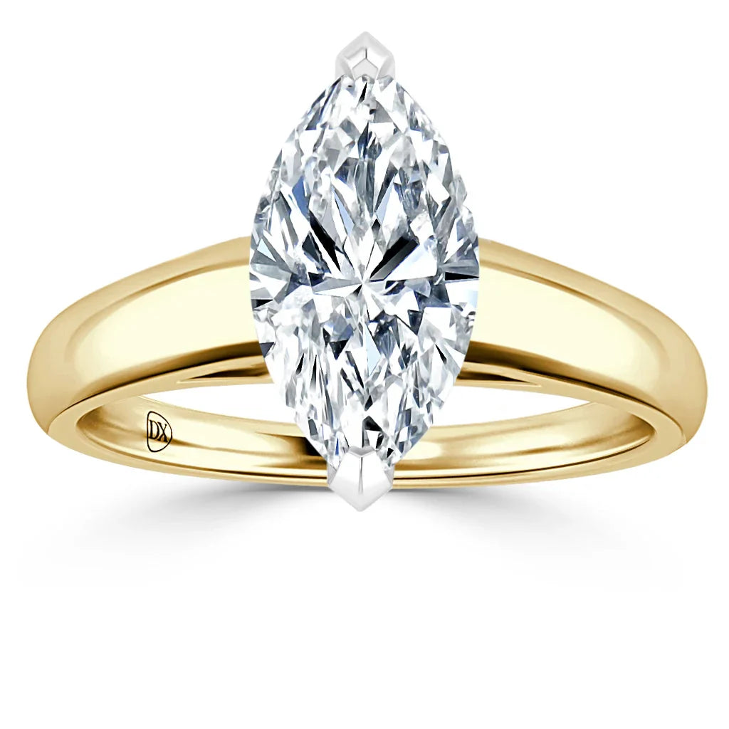 Gold band ring with a large marquise-cut diamond set in a four-prong setting, viewed from the front.