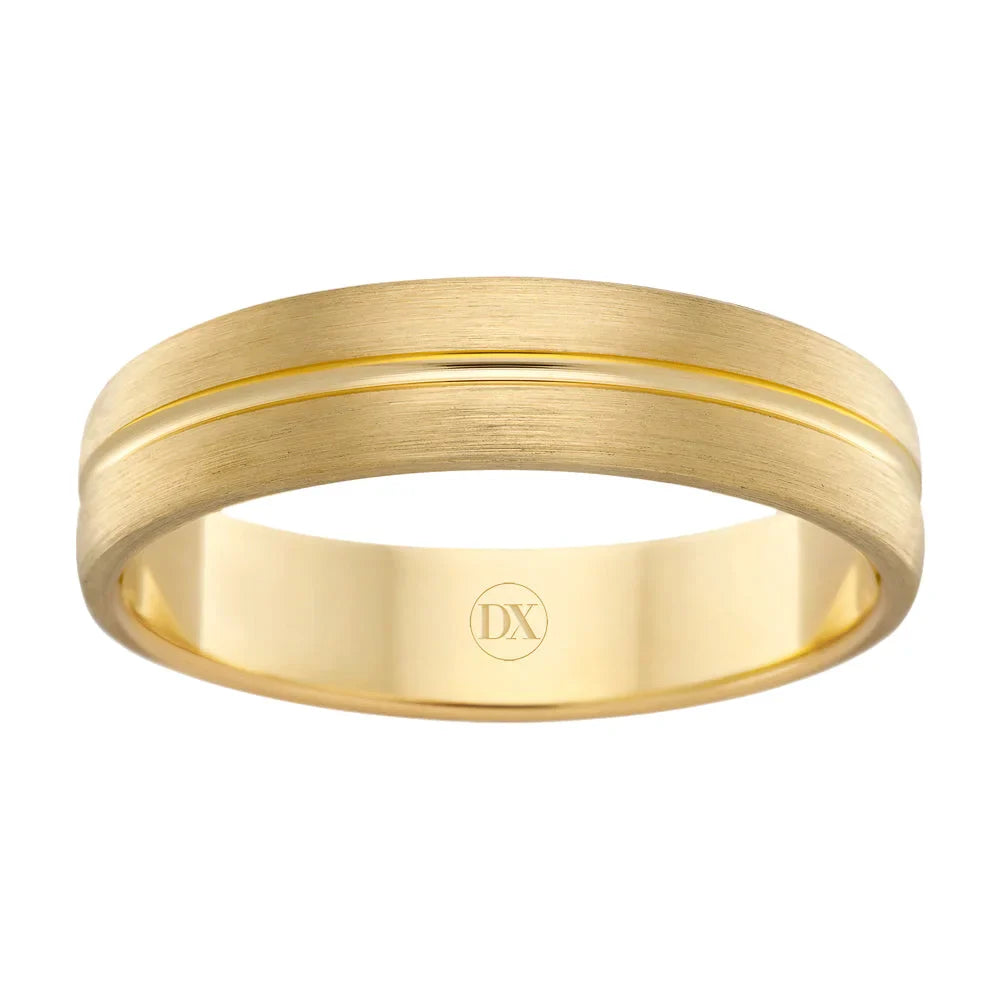 Matte gold ring with a thin polished groove around the center and DX engraved inside the band.