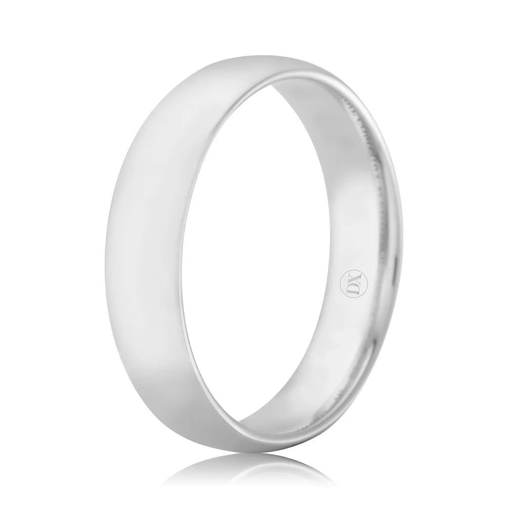 A plain, polished silver band ring with a smooth surface and a small engraved mark on the inner side.