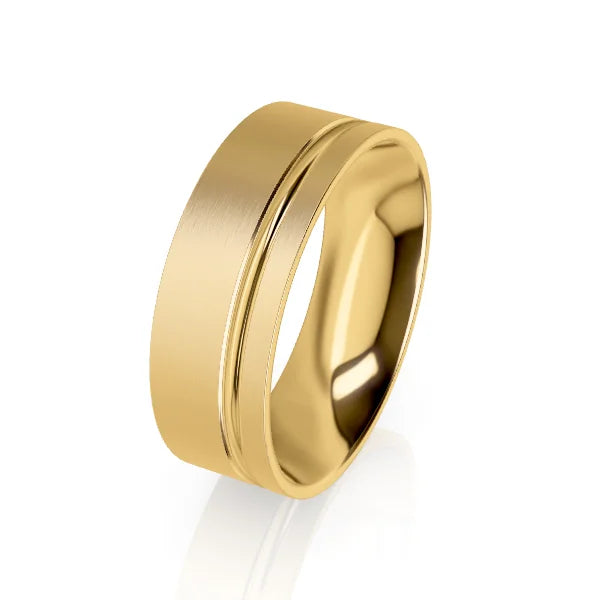 A gold wedding band with a polished finish and a single subtle groove around the center.