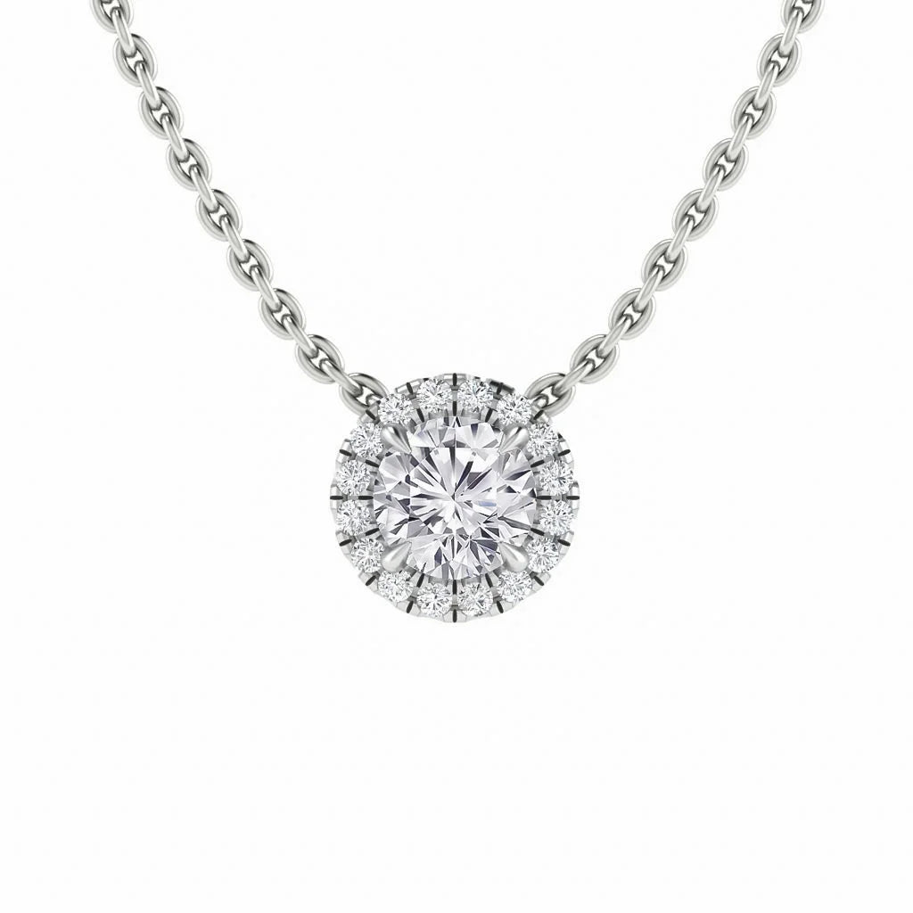 A silver chain necklace with a round, halo-set diamond pendant featuring a central large diamond.