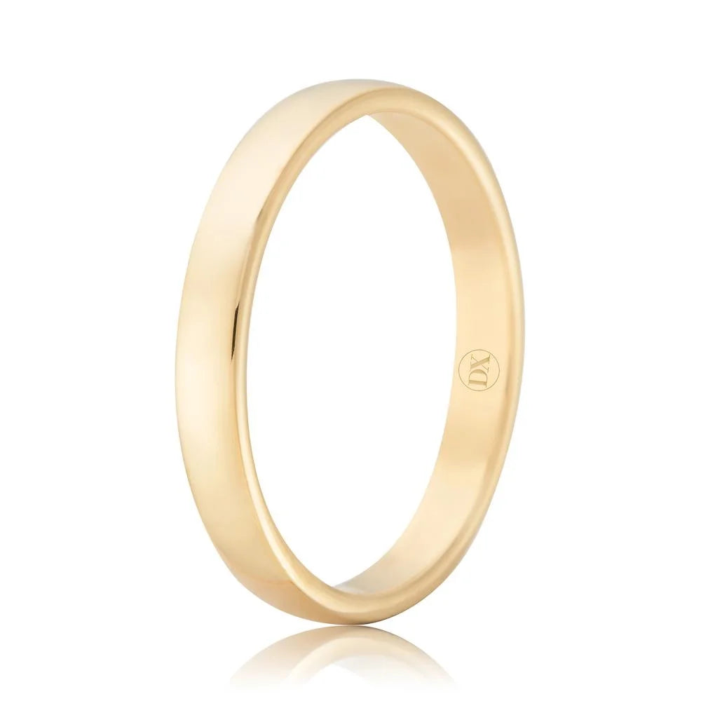 A plain, polished yellow gold band ring with a smooth surface and a small engraved logo inside.