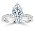 Marquise-cut diamond ring with a pavé diamond band set in white gold, shown from the front.