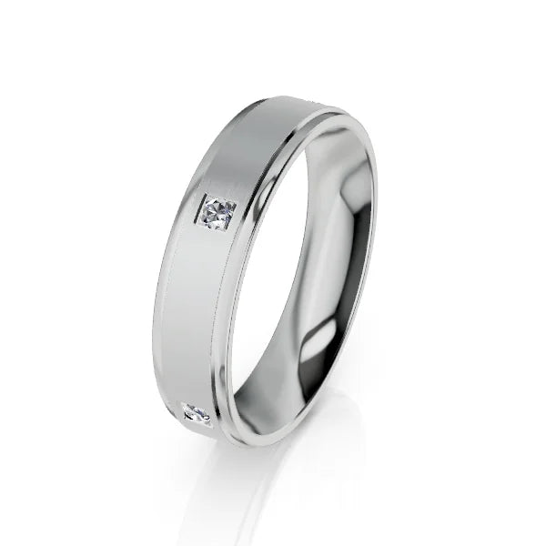 Silver band ring with two small square diamonds set opposite each other on a smooth, polished surface.