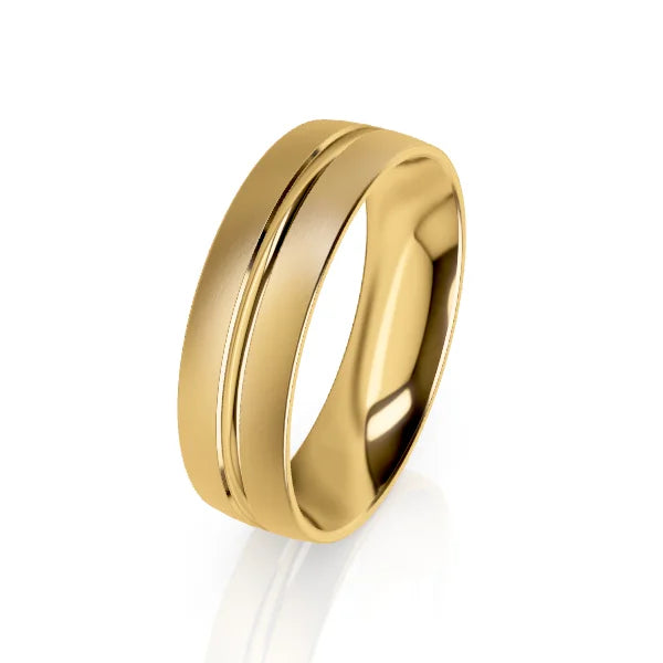 A gold band ring with a matte finish and a single polished groove running around the center.