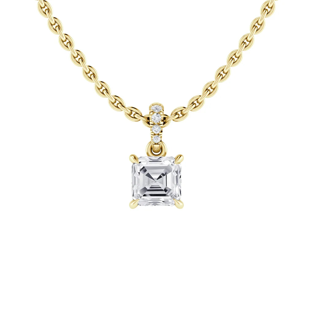Gold chain necklace with a square-cut diamond pendant and small diamonds on the pendants bail.