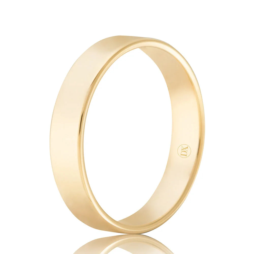 A plain, polished yellow gold band ring with a smooth finish and a small engraved logo inside.