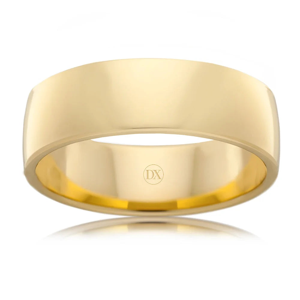 Plain, polished yellow gold band ring with a flat surface and a small DX engraved inside.