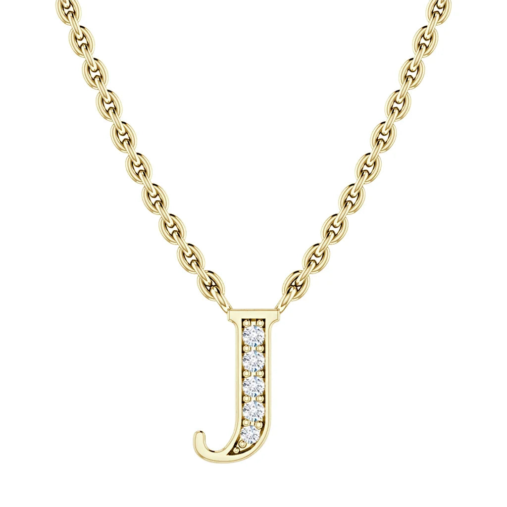 Gold chain necklace with a gold letter J pendant encrusted with small white gemstones.