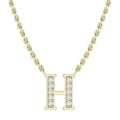 Gold chain necklace with a diamond-studded letter H pendant, shown on a white background.