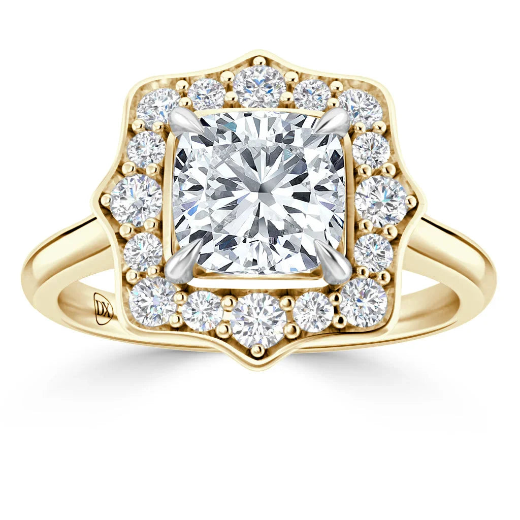 Gold ring with a square-cut center diamond, surrounded by a halo of smaller round diamonds.