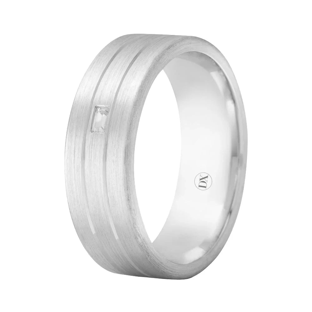 Matte silver ring with two parallel grooves and a small rectangular inset diamond on the band.