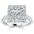 Platinum ring with a square-cut center diamond, surrounded by a double halo of round diamonds.