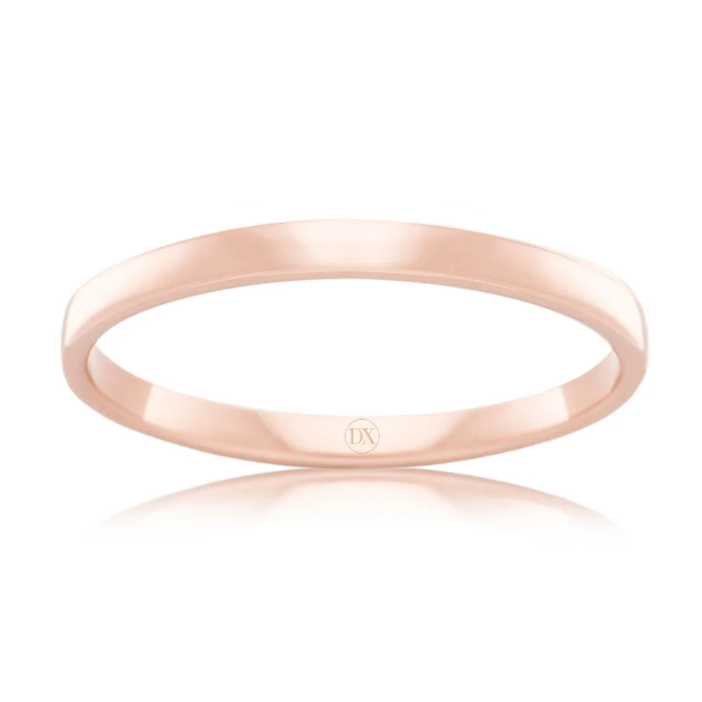A thin, polished rose gold ring with a simple design, shown on a white background.
