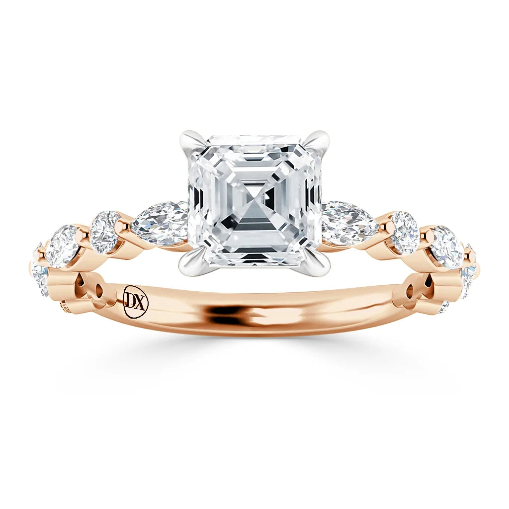 Square diamond ring with rose gold band, featuring oval side stones and an engraved DX on the inner band.