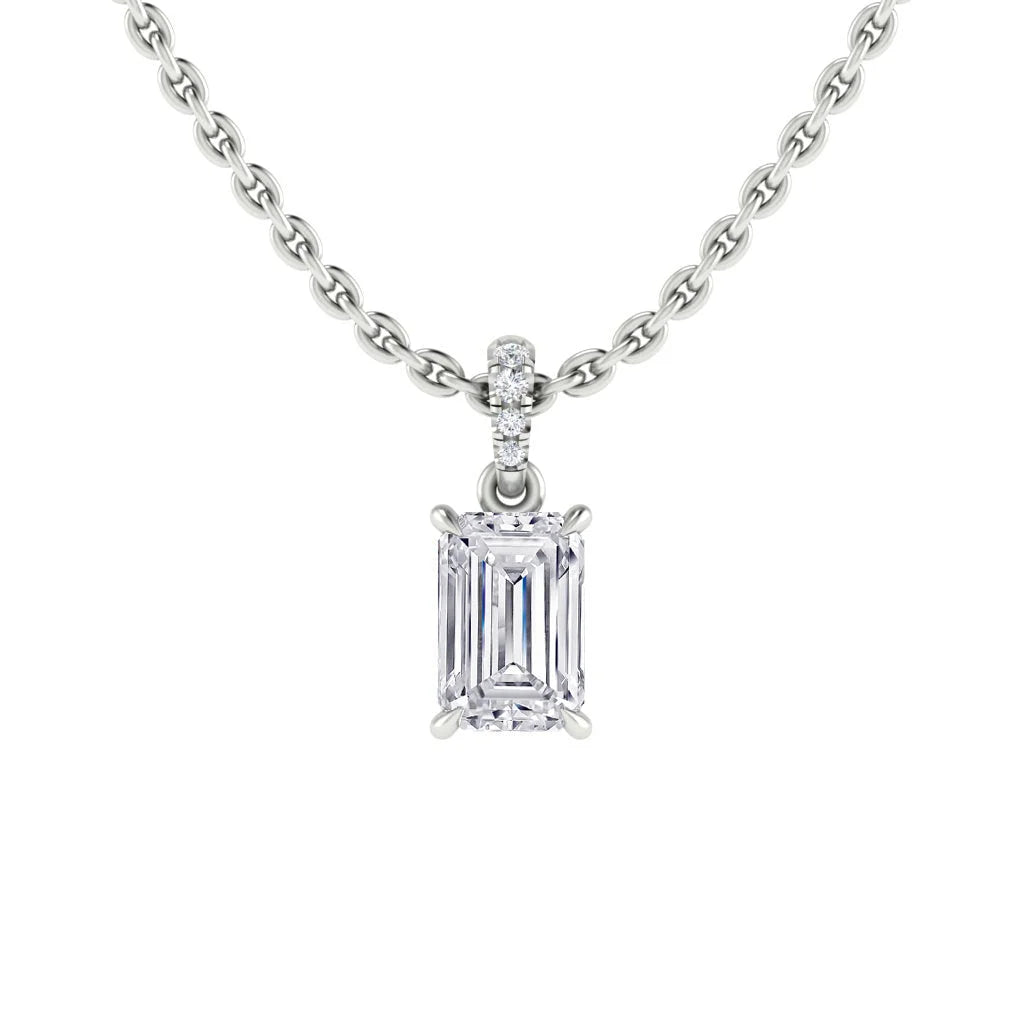 A silver chain necklace with an emerald-cut diamond pendant in a four-prong setting.