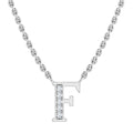 A silver necklace with a pendant shaped like the letter F, partly embellished with small clear gemstones.