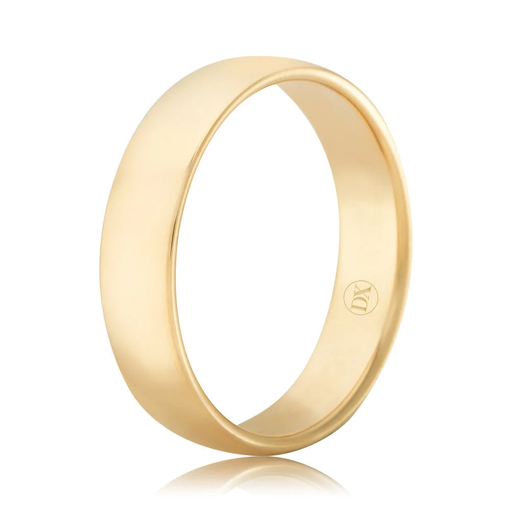 A plain, polished yellow gold ring with a smooth surface and a small engraved logo on the inner band.