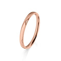 A simple, polished rose gold ring with a smooth, rounded band on a white background.