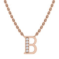 Gold chain necklace with a capital letter B pendant, accented with small clear gemstones on the left side.