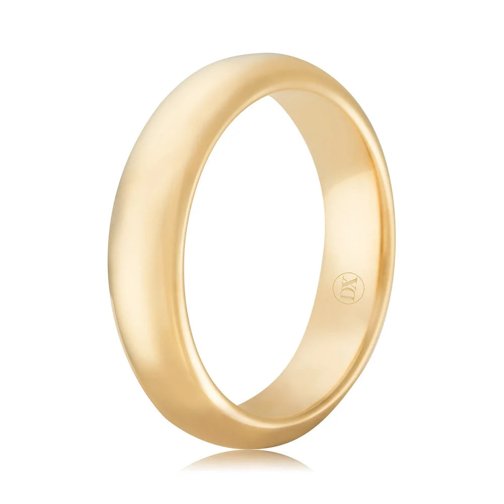 A plain, polished gold band ring with a smooth finish and a small engraved logo on the inner surface.
