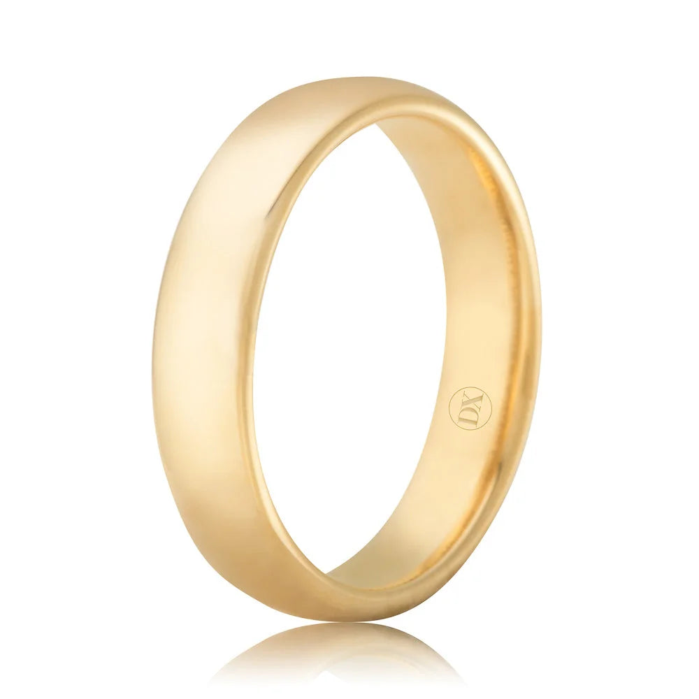 Simple yellow gold wedding band with a smooth, polished finish and a small engraved logo inside.