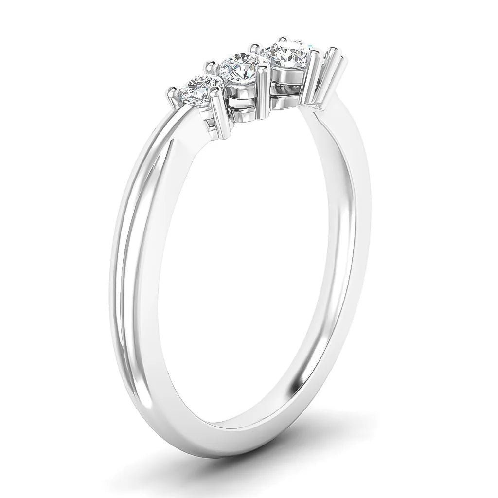 A silver ring with three round, white diamonds set side by side on a slender, polished band.