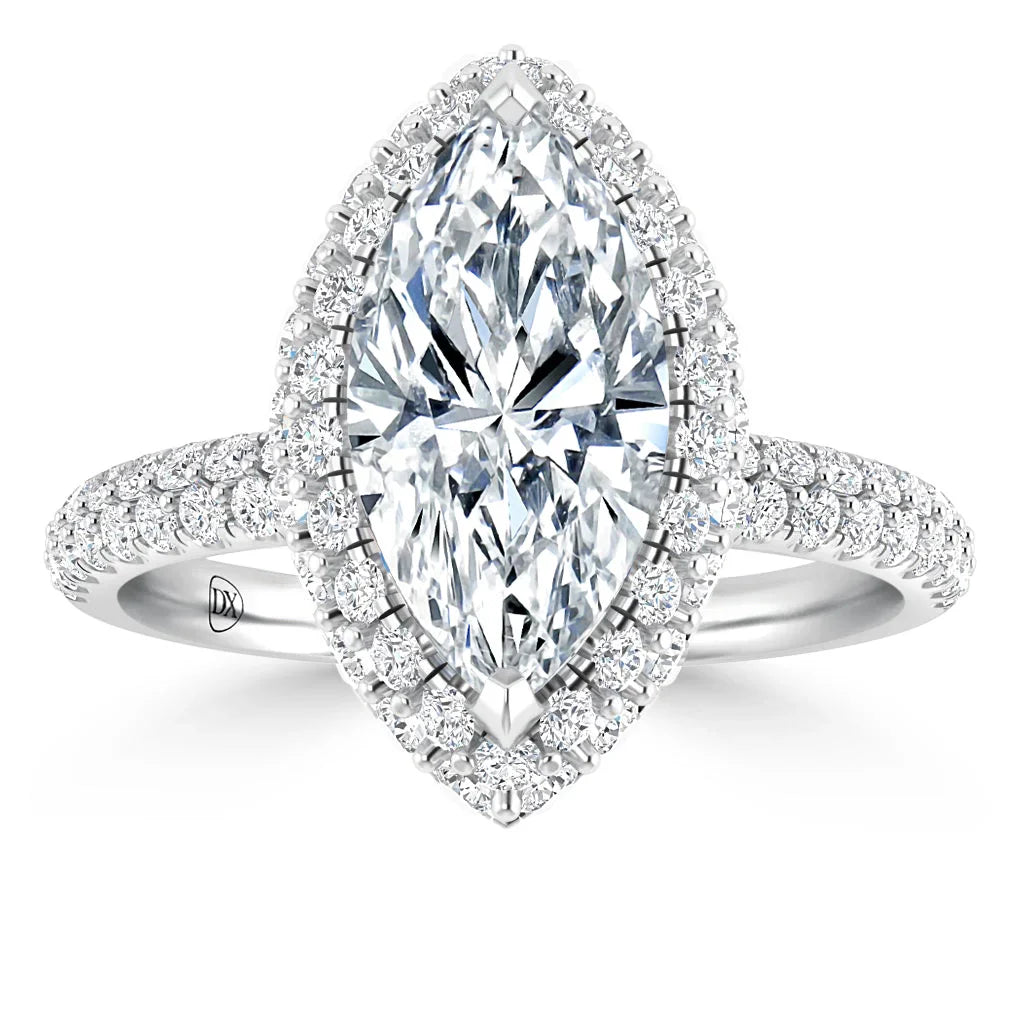 Marquise-cut diamond ring with a double halo of smaller diamonds on a pavé diamond band, shown on white background.