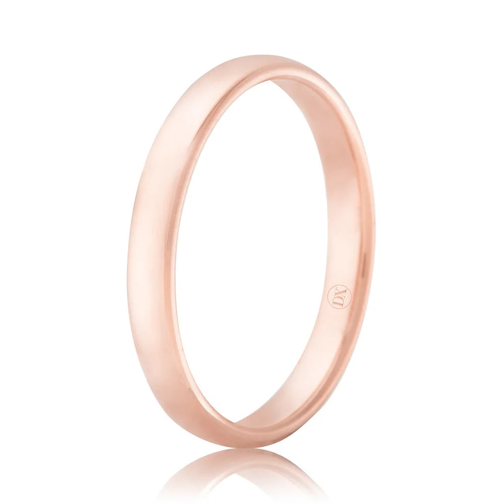 A simple, polished rose gold band ring with a smooth, rounded surface, shown on a white background.
