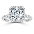 A square halo diamond engagement ring with a large center stone and pavé diamonds on the band.