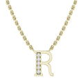 Gold necklace with a pendant shaped like the letter R, half set with small sparkling diamonds.