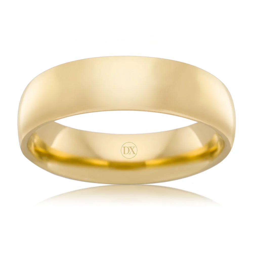Simple, polished yellow gold wedding band with a smooth surface and subtle inner engraving on a white background.