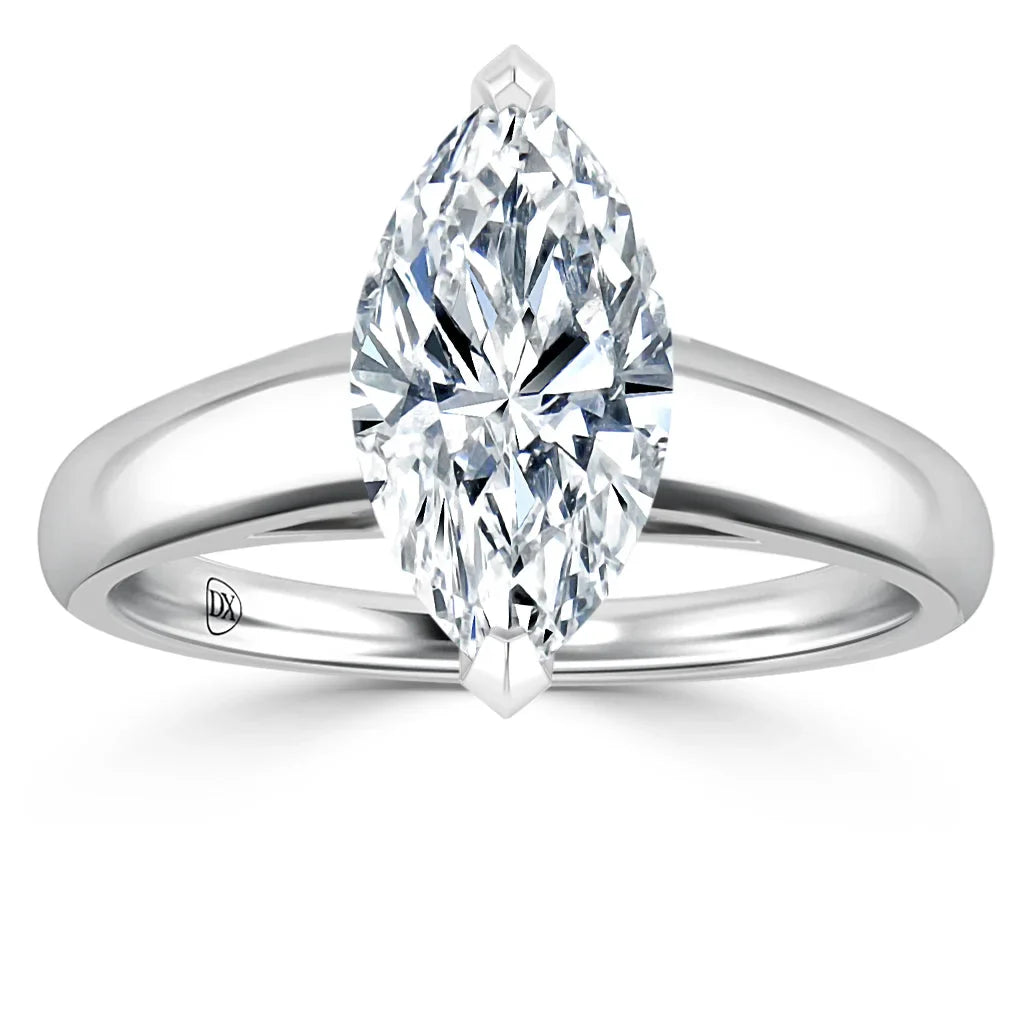Marquise-cut diamond solitaire ring with a simple, polished white gold band, shown from the front.