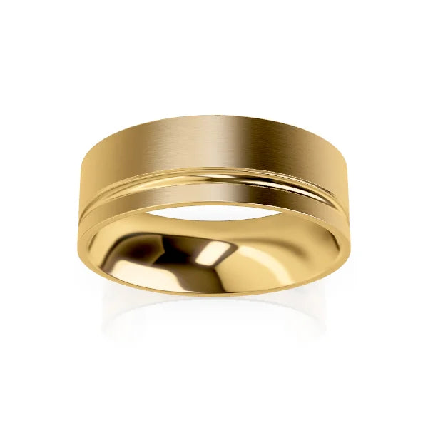 Wide gold ring with a brushed finish and a single polished groove near one edge, on a white background.
