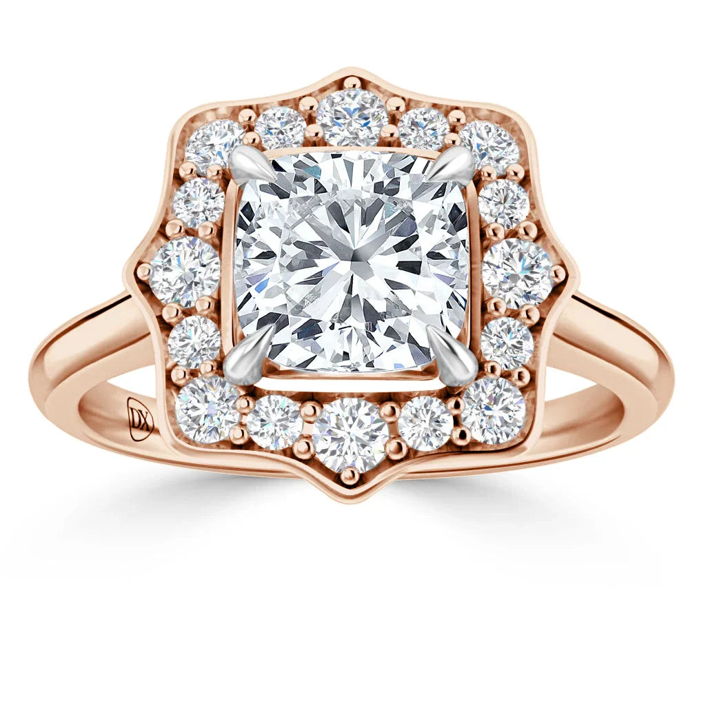 Rose gold ring with a square center diamond, surrounded by a halo of round diamonds on a split shank band.
