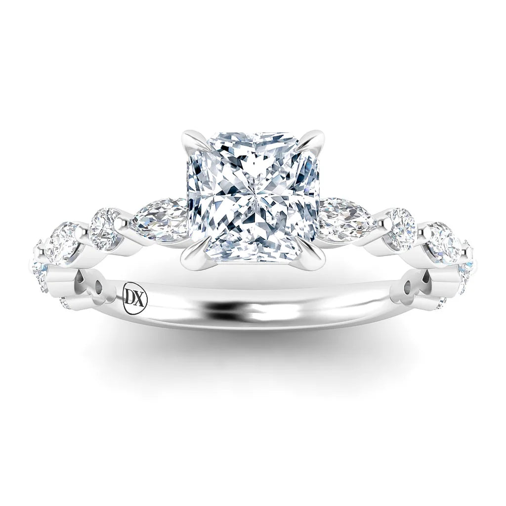A cushion-cut diamond ring with a twisted band featuring marquise and round accent diamonds on a white gold setting.