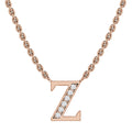 Rose gold chain necklace with a letter Z pendant, half encrusted with small sparkling diamonds.