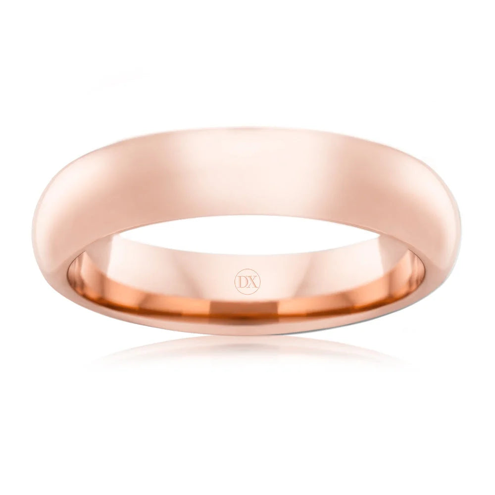 A plain, polished rose gold wedding band with a rounded profile displayed on a white background.