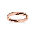 A simple, polished rose gold wedding band ring on a white background.