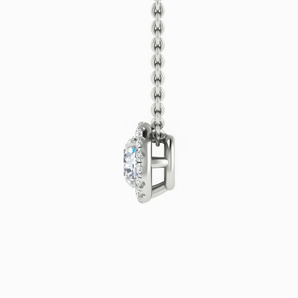 Side view of a silver chain necklace with a round, prong-set clear gemstone pendant against a white background.