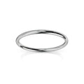A thin, polished silver ring with a smooth, rounded surface, displayed on a white background.