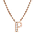 Rose gold chain necklace with a letter P pendant, half encrusted with small clear gemstones.
