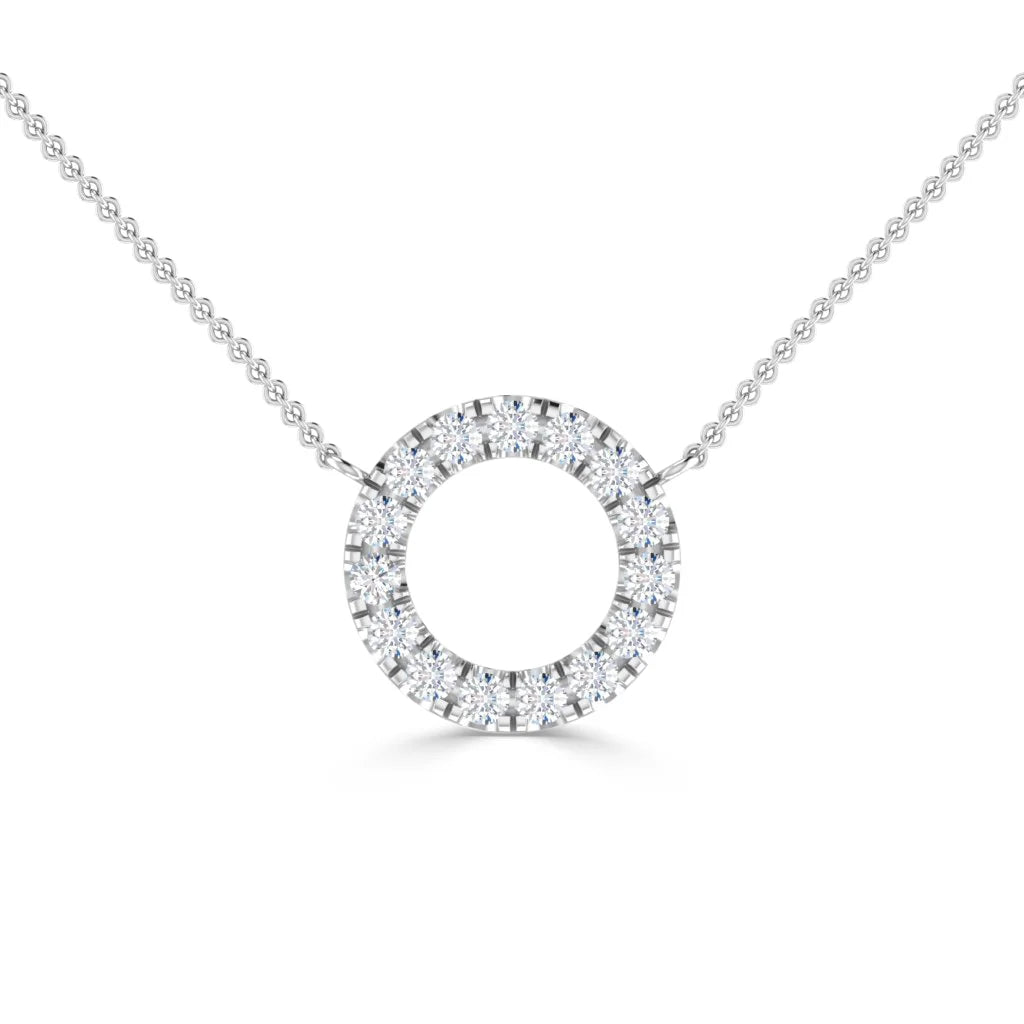 A silver chain necklace with a circular pendant encrusted with small diamonds, shown on a white background.