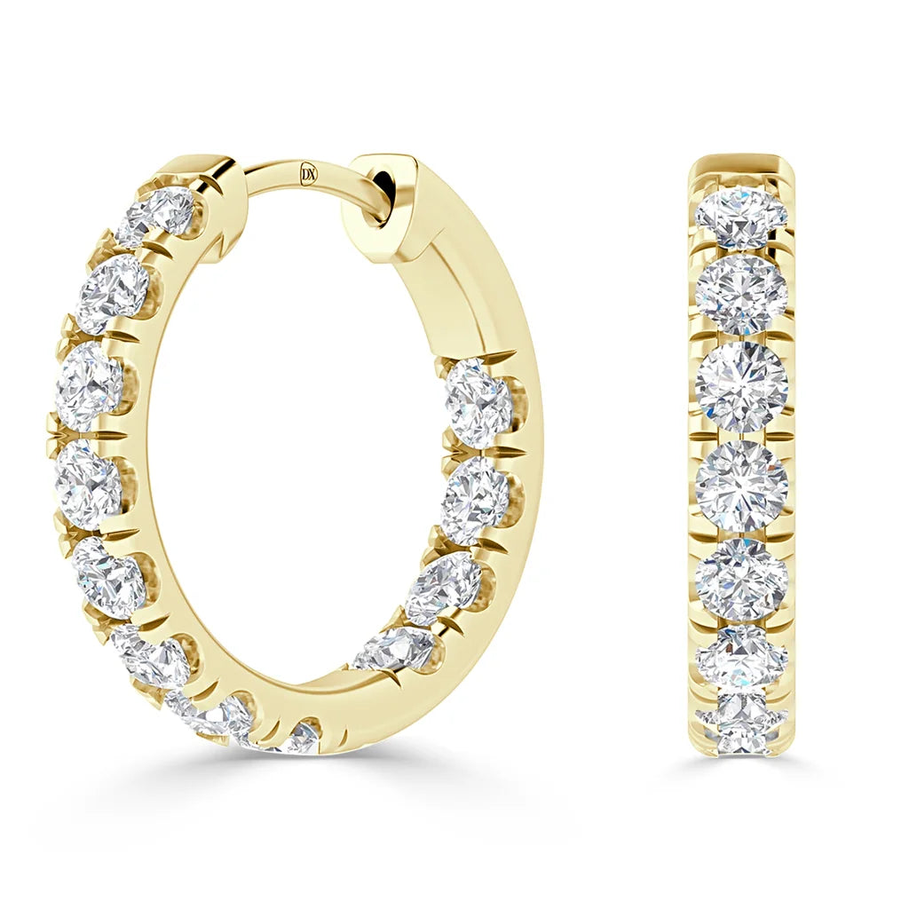 Gold hoop earrings with round, prong-set diamonds on the front and inner curve, shown from two angles.
